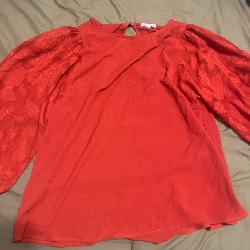 32.Orange sheer shirt